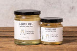 Two glass jars of Laurel Hill Champagne Wine Jelly
